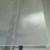 lens sheet with adhesive