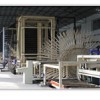 Multi-layer particle board production line
