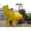 Self falling concrete drum mixer